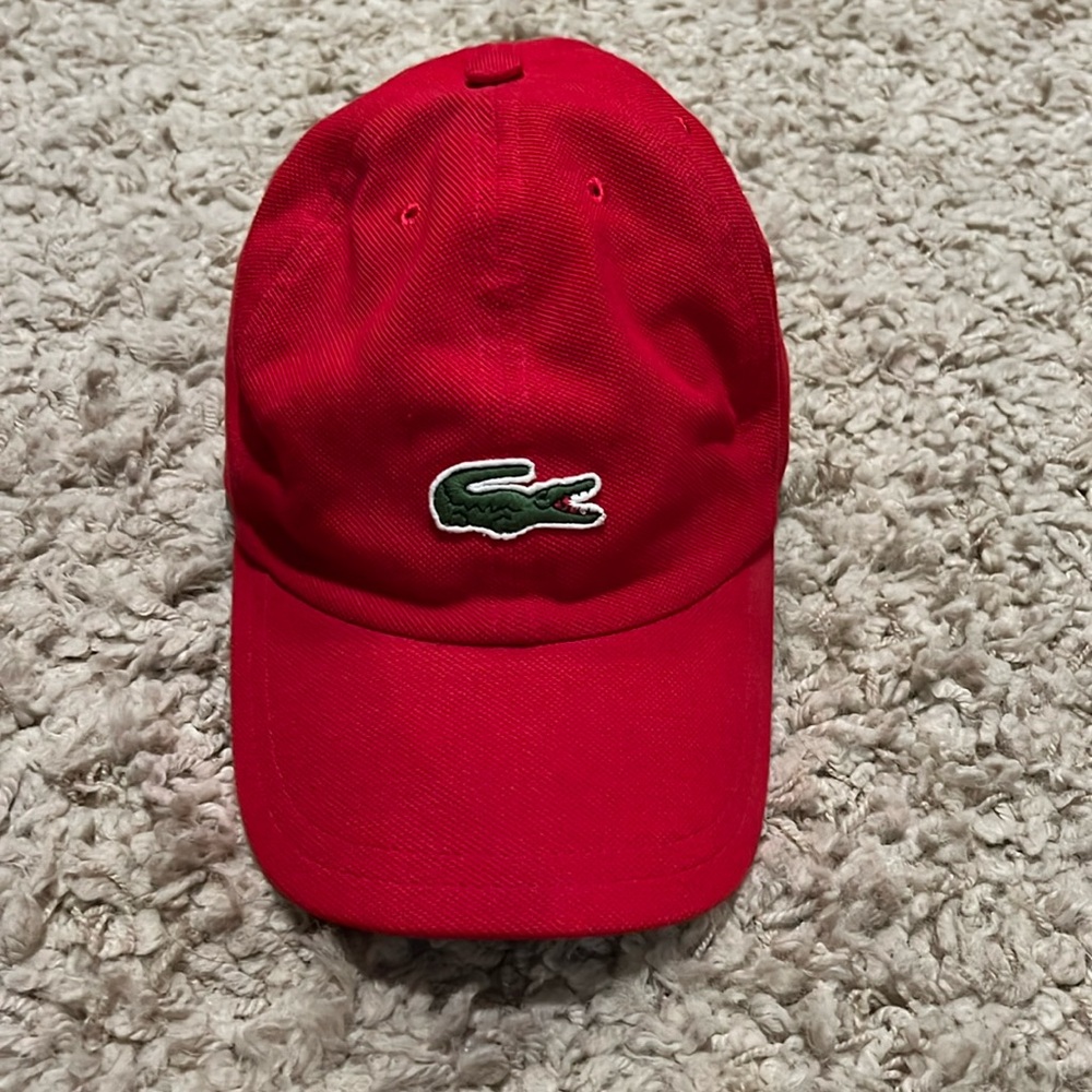 Lacoste  Cap with adjustable velcro back.